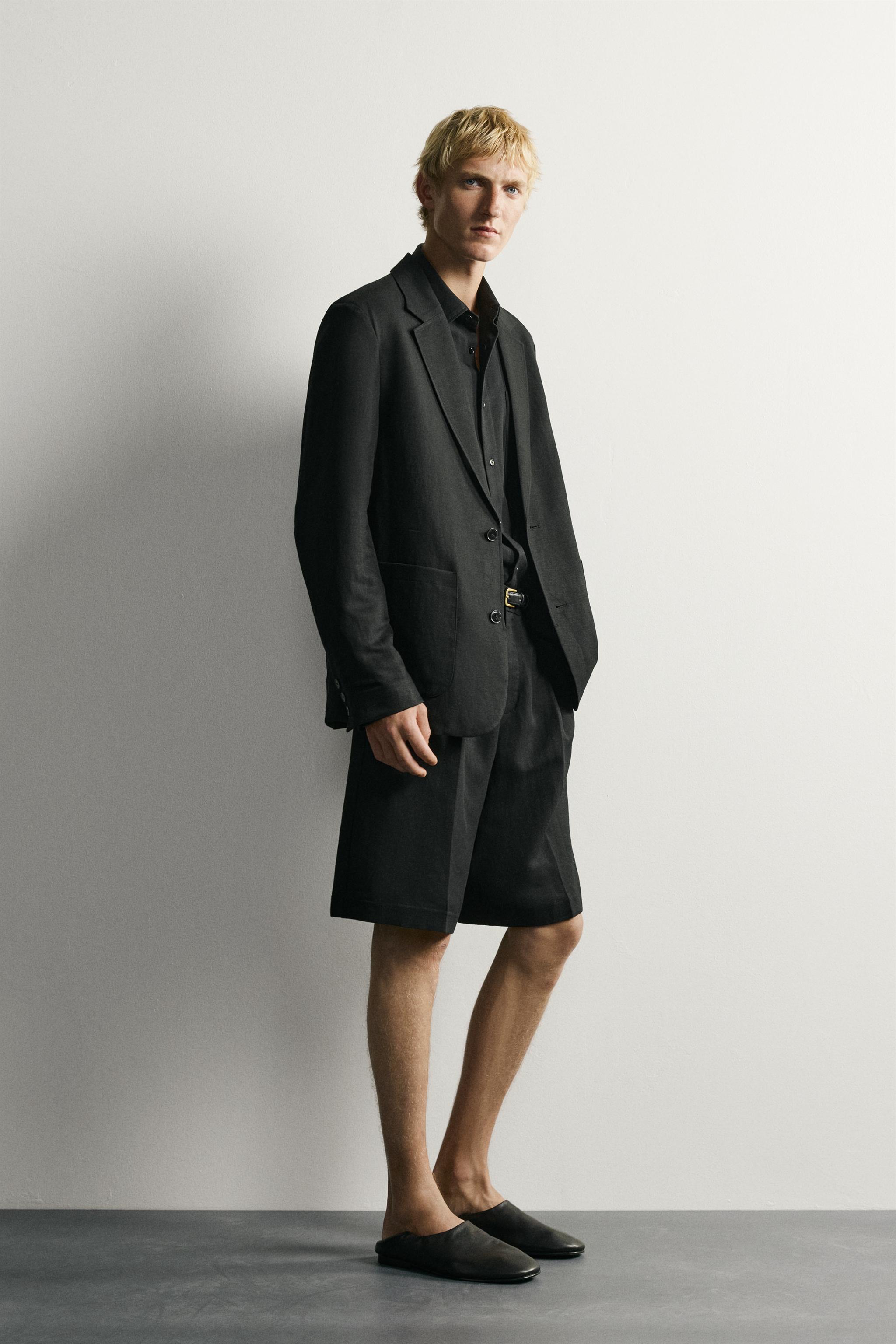 TEXTURED PLEATED SUIT SHORTS